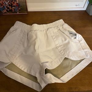 White faux leather shorts